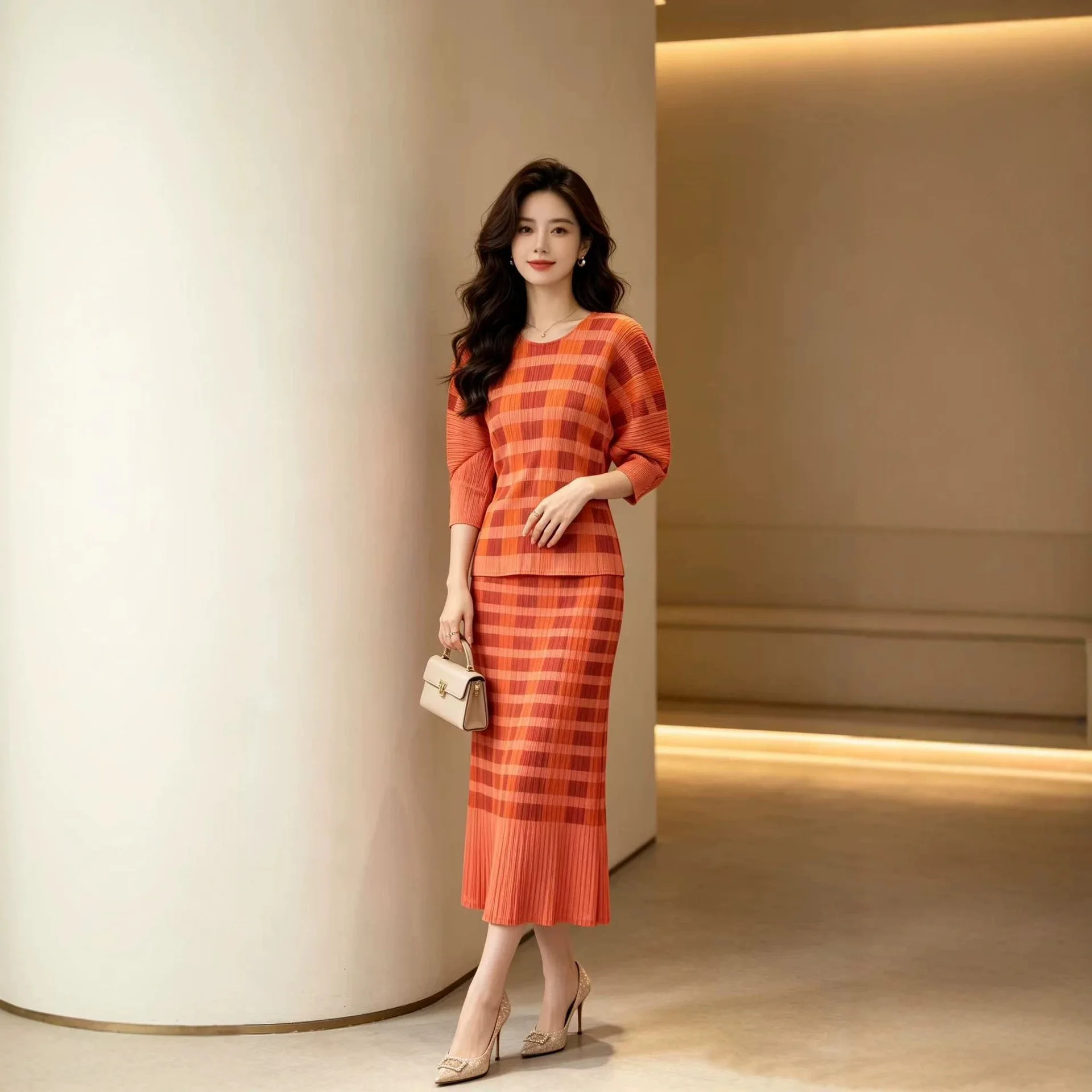 Miyake pleated women's casual suit 2026 new contrasting color plaid printed top and skirt two-piece set