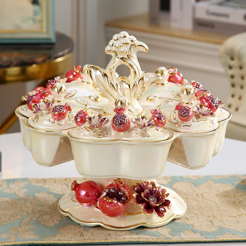 European fruit plate ceramic high-end luxury creative rotating dried fruit plate grid with cover household living room coffee ta