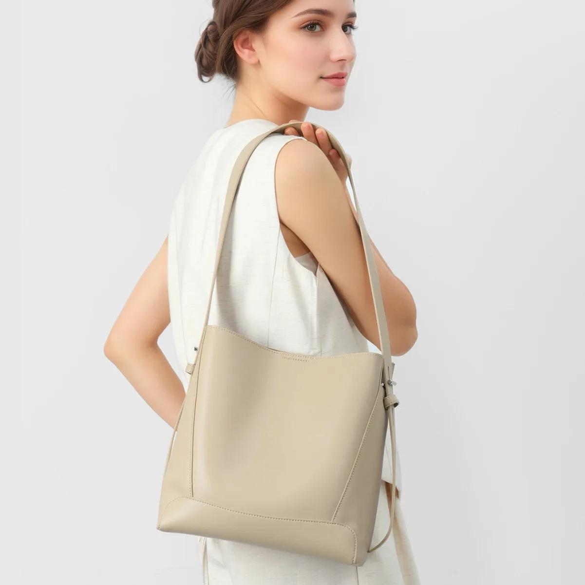 

Новая женская сумка 2026 года: универсальная кожаная сумка через плечо, вместительная сумка-ведро для города, осенне-зимняя коллекция