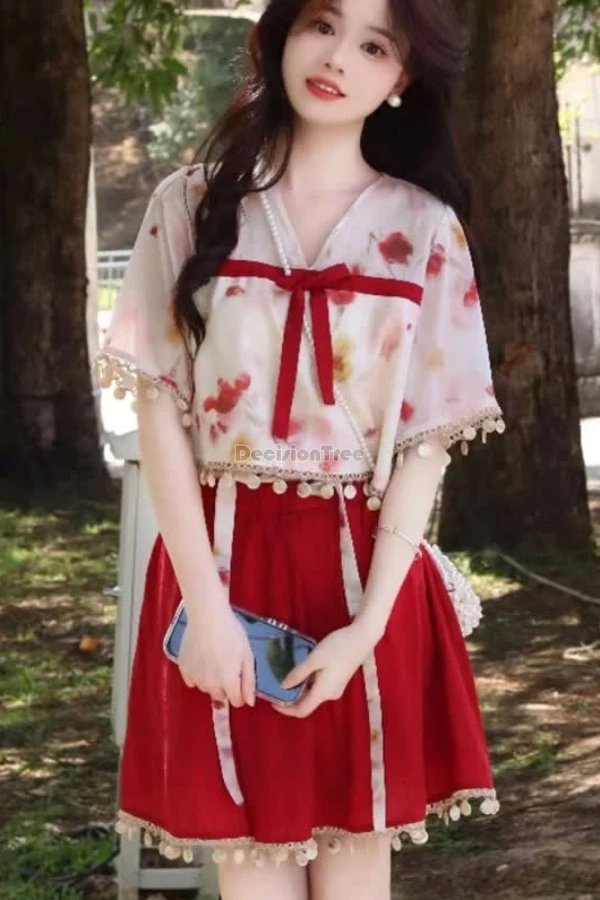 

2025 new improved fashion modern daily hanfu set summer chinese style short sleeve printed tassel bouse skirt 2 piece modern set