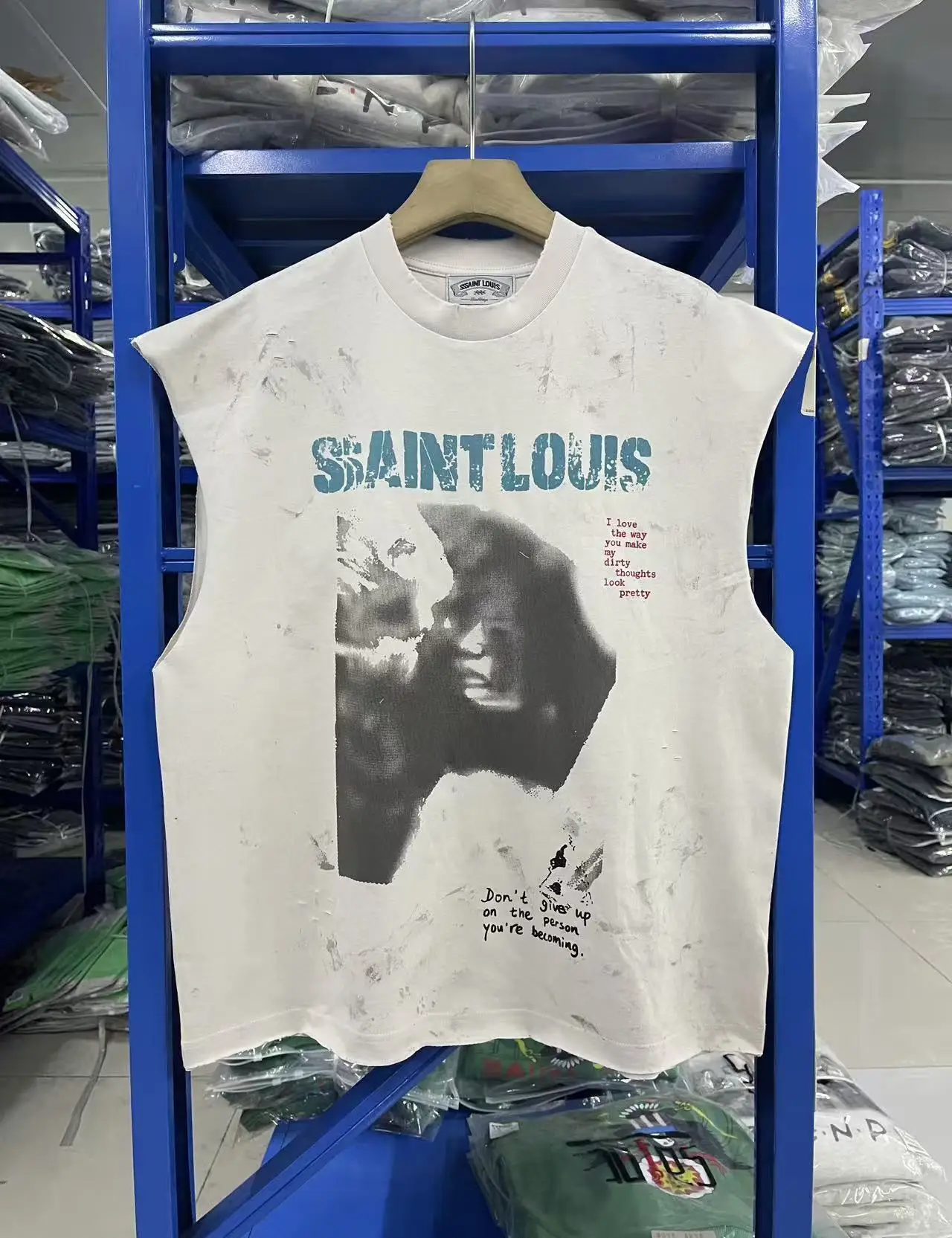 SSSAINT LOUIS American streetwear brand Blue lettering logo. Street style Washed and aged effect. Sleeveless T-shirt