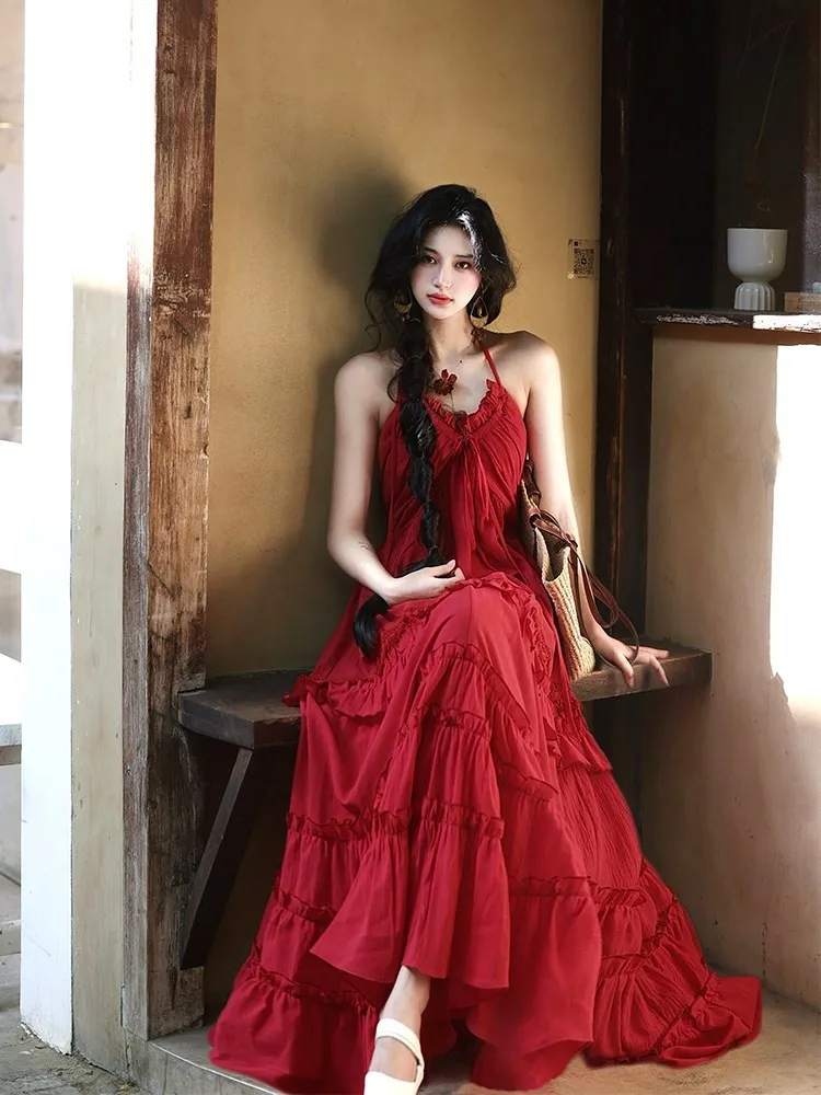 

A long dress with red collar halter tops and small backless cake