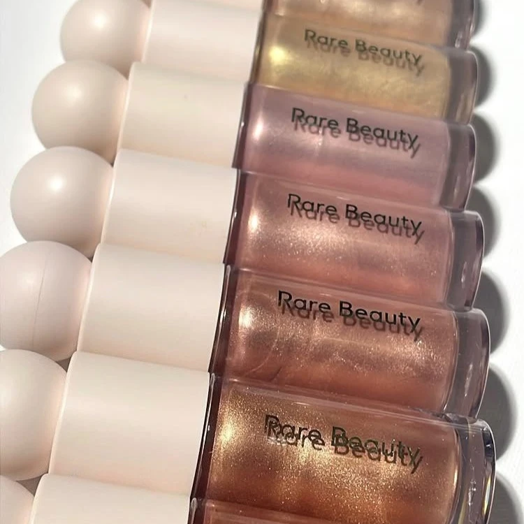 Rare Beauty Positive Light Liquid Luminizer Rozświetlacz w płynie z efektem rozświetlania Makijaż Rozświetlacz w sztyfcie do policzków Oczy Twarz Kosmetyki