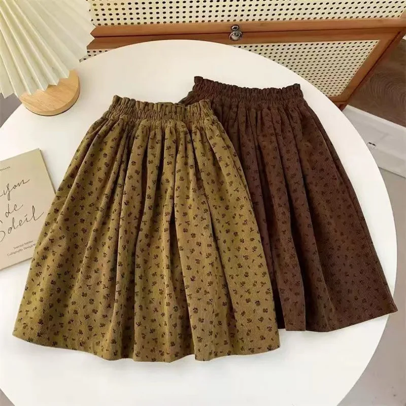 

2025 Autumn and Spring New Girls Floral Skirt Children's Coffee Colored Floral Fashion and Beautiful Forest Style Skirt