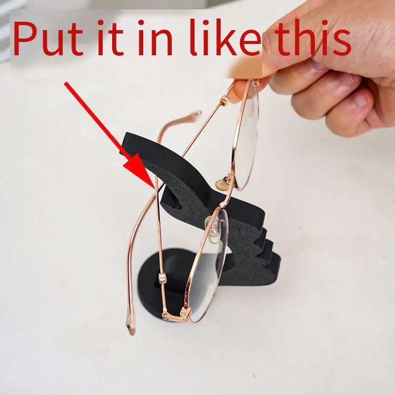 Sculpturalny stojak na okulary: elegancki kształt siluety twarzy zapewniający bezpieczeństwo okularów i stylowy, minimalistyczny profil twarzy jako podstawka pod okulary.