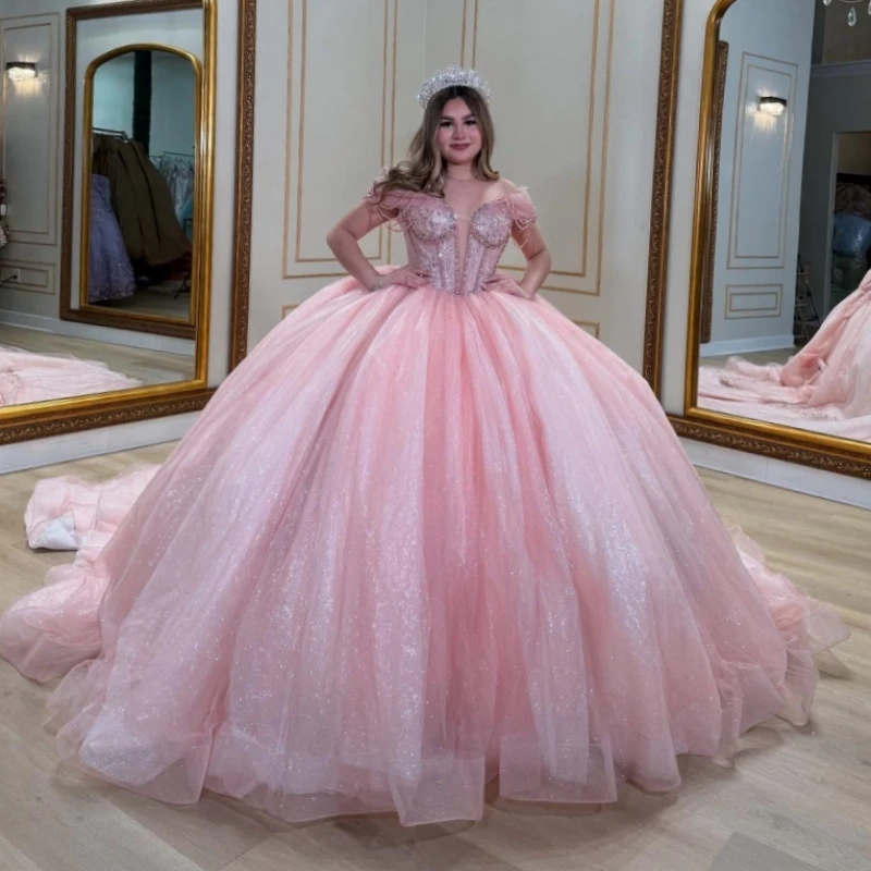 

Pink Shiny Quinceanera Dresses Ball Gown Off The Shoulder Applique Bow Beading Crystal Tull Corset Sweet 16 Dress Vestidos 15