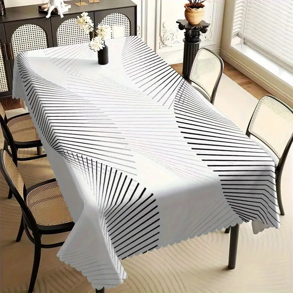 One fashionable grey and white geometric check tablecloth with a scalloped edge made of polyester fiber