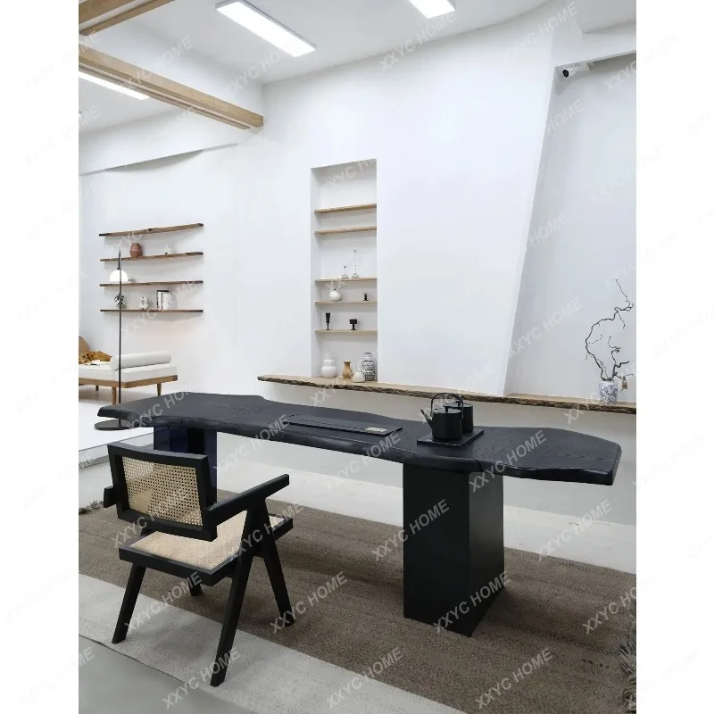 

SLwabi sabi medieval carbonized black solid wood tea table, designer desk log special-shaped large board tea table
