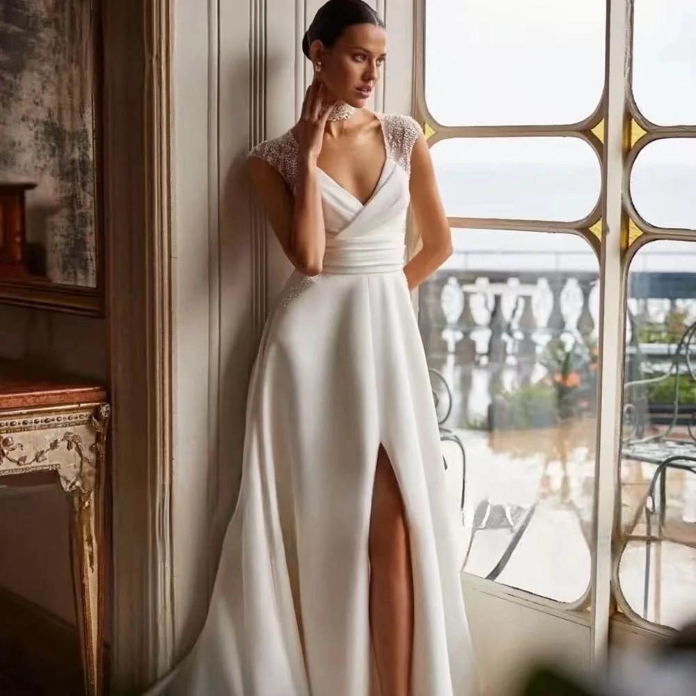 

Luxury V Neck Satin A Line Wedding Dresses Elegant Backless Appliques Robe Beaded Court Train Bridal Gown Cap Sleeve Vestidos