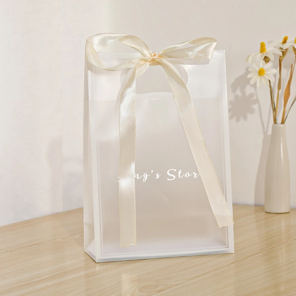 

24Pcs Custom Logo Beige Jewelry Gift PP Bag Wedding Shopping Stationery Packaging PVC EVA Handbag Ribbon Bowknot Plastic Pouches