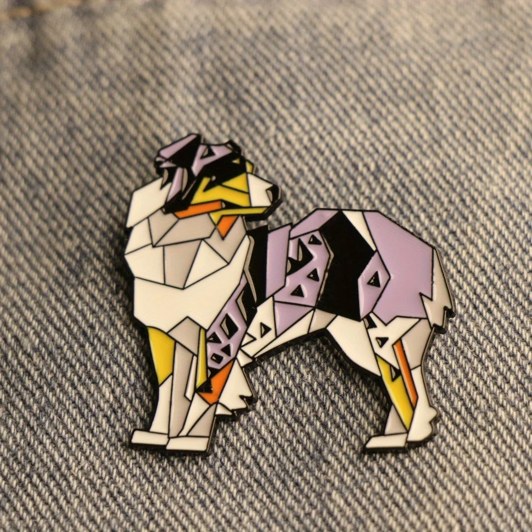 Cute animal pin with geometric sheepdog design, suitable for all genders as wearable accessory or gift.