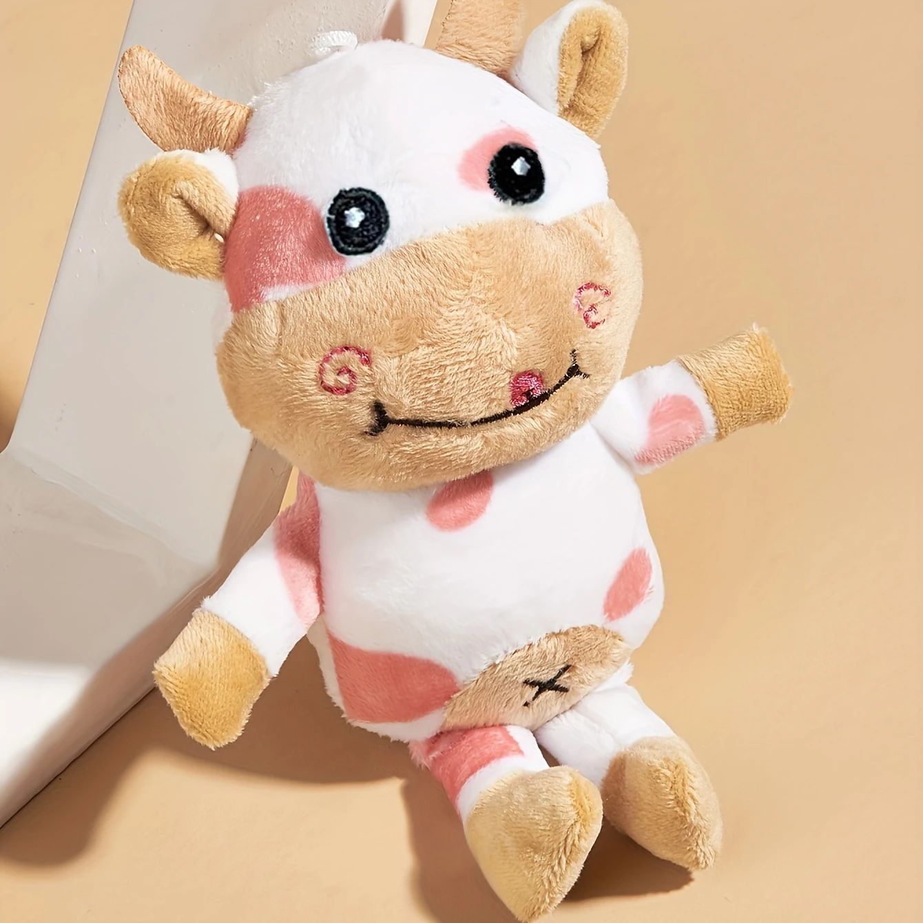 A mini cartoon cow plush toy for pet grinding teeth cleaning teeth play plush toy, there is no sound inside, suitable for pets t