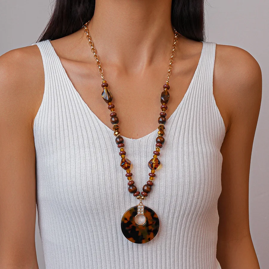 

Leopard Acrylic Wooden Bead Hollow Circular Pendant Necklace for Women Retro Long Sweater Chain Unique Fashion Jewelry Accessory