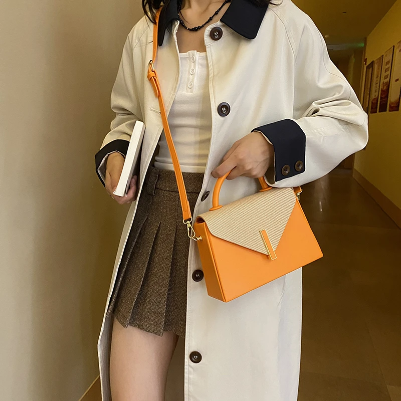 Minimalistische, einzigartige Vintage-Umhängetasche für lässige Frauen mit einfarbigem Buchstabenlogo und großem Fassungsvermögen