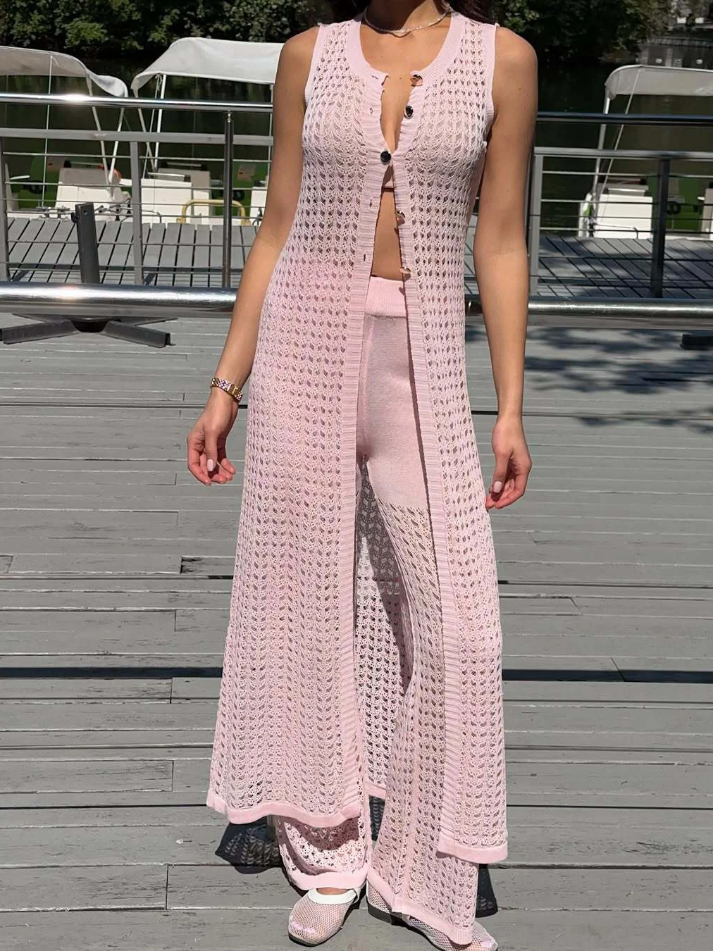 

Vhiuat Women Fashion 2 Piece Outfit Knitted Sleeveless Tops+Elastic Waist Pants Summer Hollow Out Beach Holiday Pants Set 2025