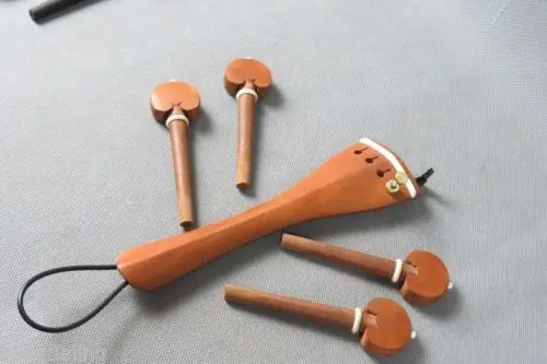 

1 set of jujube wood 4/4 cello tailpiece,4pcs pegs with finietuner,tail gut.