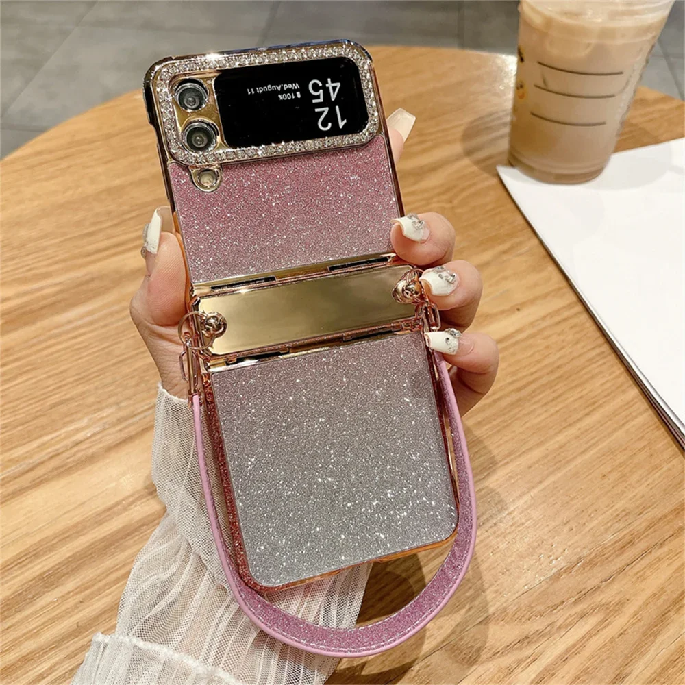 

Glitter Diamond Wristband Case for Samsung Galaxy Z Flip 5 4 3 ZFlip flip5 Flip4 Bling Gradient Wrist Hand Strap Plating Cover