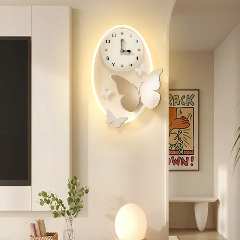 

Cream wind TV background wall wall clock living room butterfly clock simple home creative clock wall