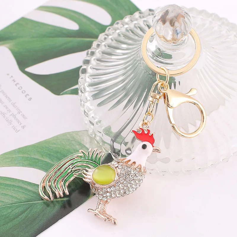 พวงกุญแจรูปตาแมวน่ารัก สีสันสดใส ประดับด้วยหิน ขนาดใหญ่ เหมาะสำหรับผู้หญิง ผู้ชาย พวงกุญแจรถยนต์ เครื่องประดับสำหรับงานปาร์ตี้ งานแต่งงาน ของขวัญสำหรับสาวๆ