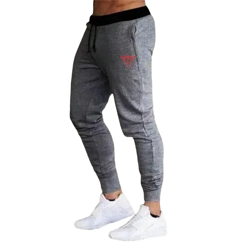 Pantaloni della tuta abbigliamento abbigliamento Fitness pantaloni da jogging autunno uomo/donna Running Joggers pantaloni sportivi pantaloni Casual