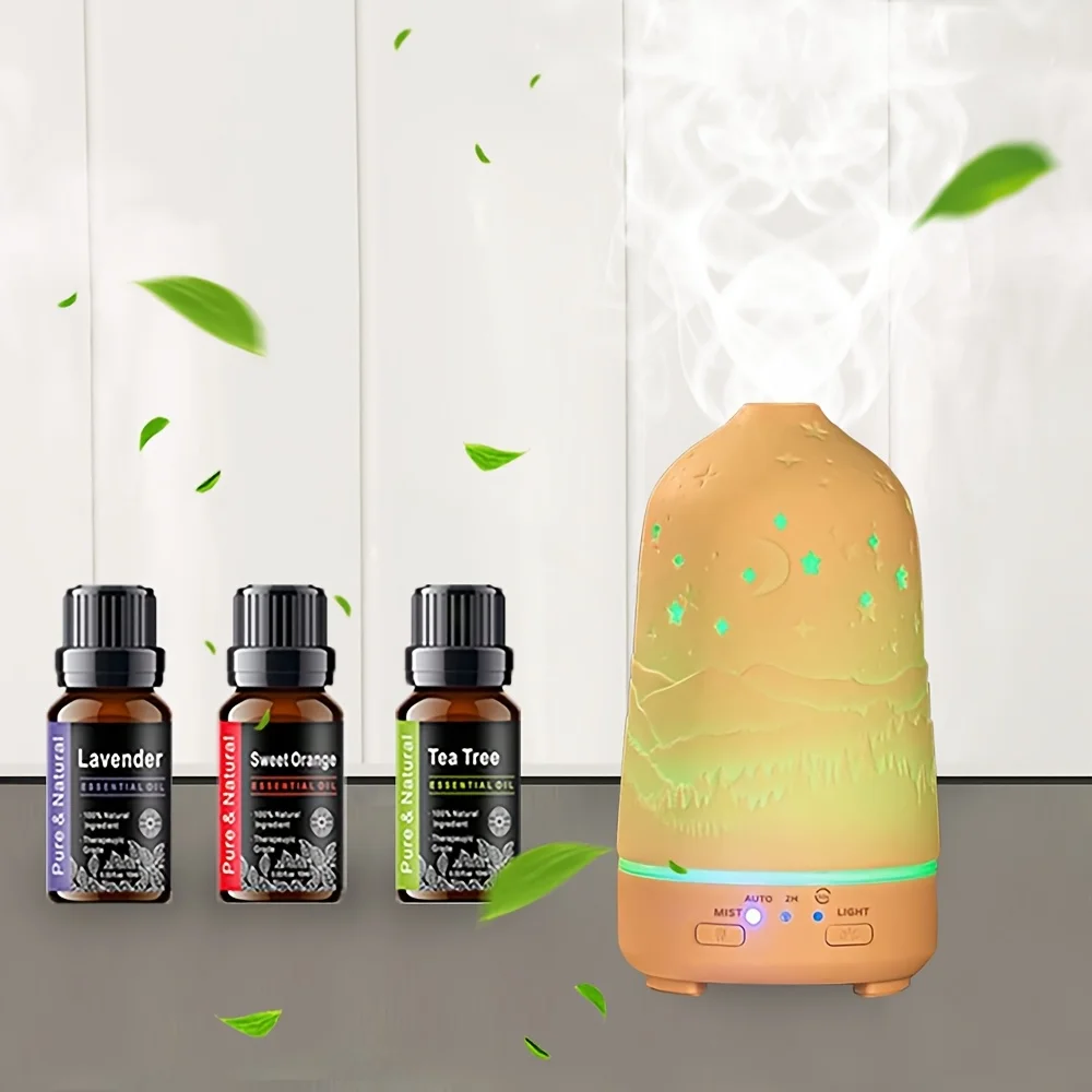 Essential Oil Diffuser with 7-Color LED Lights 3.38oz Mist Humidifier Soothing Auto Shut-Off Includes 3 Free Oils