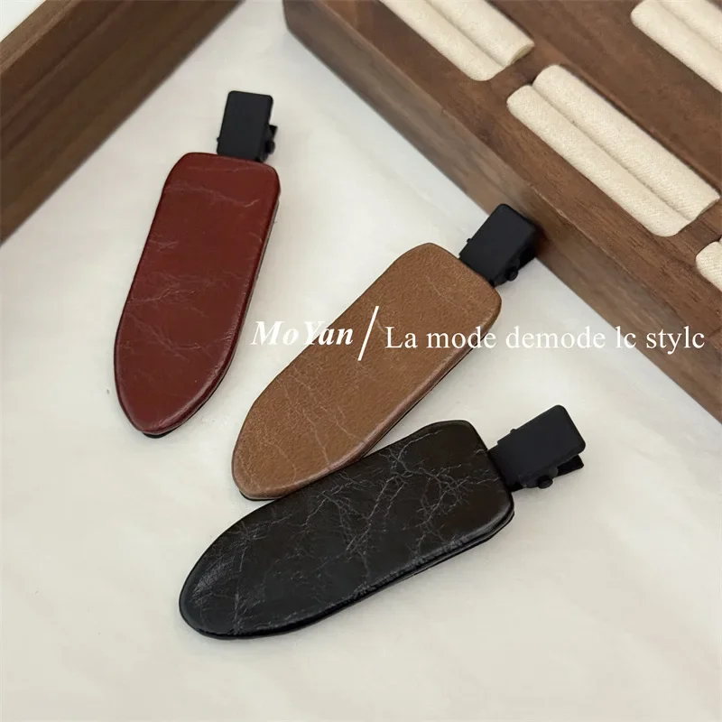 Grampo de cabelo de couro texturizado de alta qualidade com temperamento feminino versátil bangsclip cabelo quebrado edgeclip clipe sem costura duckbillclip