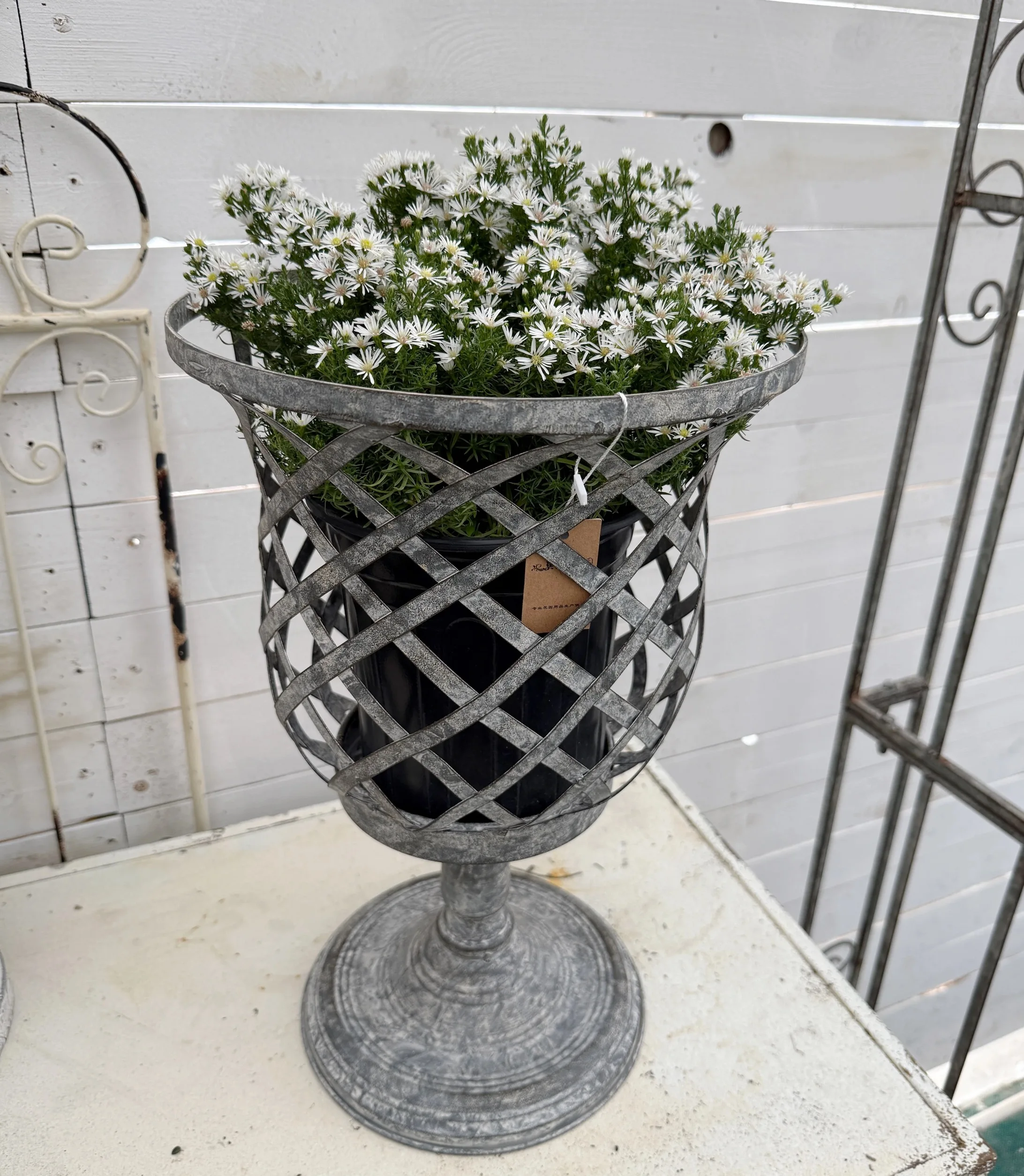 

Vintage Garden Decor Metal Lattice Planter,Gray Distressed Pedestal Urn,Criss-Cross Pattern Flower Holder,16Inch Height