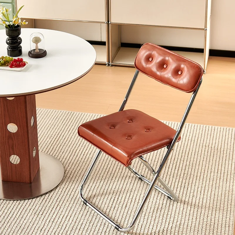 Medieval foldable dining chair, modern minimalist metal soft bag chair, cafe bed and breakfast backrest folding chair