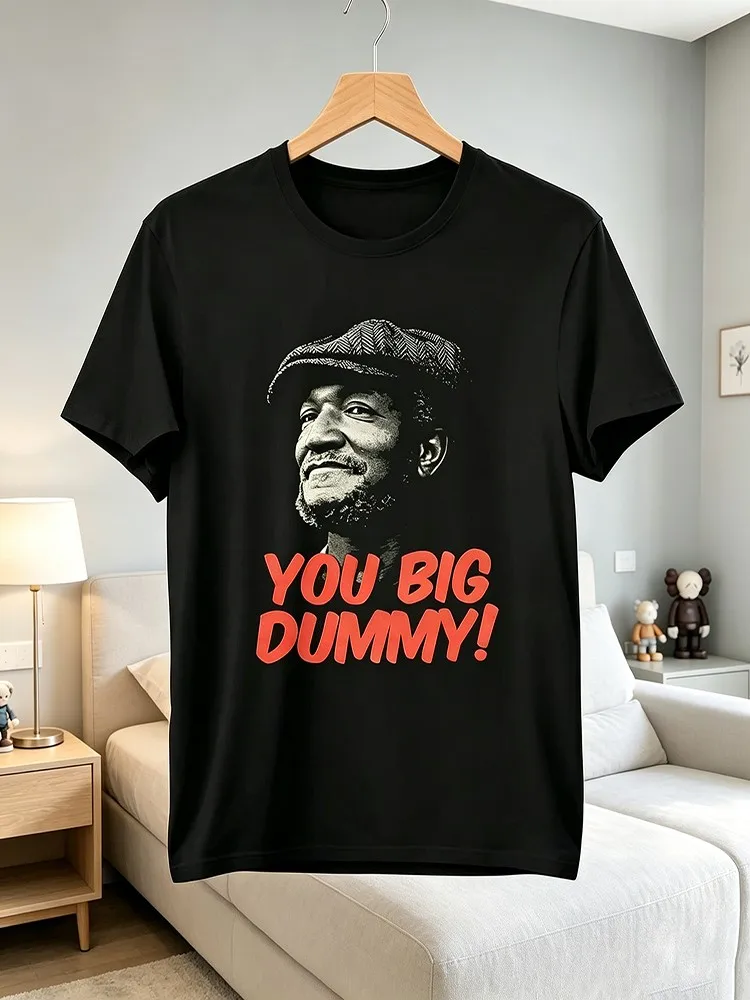 Funny Graphic Tee for Men - Black T-Shirt Featuring a Bearded Man in a Flat Cap with Bold Red 'YOU BIG DUMMY! ' Text _ Unique Statement Design for Casual Wear _ Perfect for Humorous Gift Ideas, on
