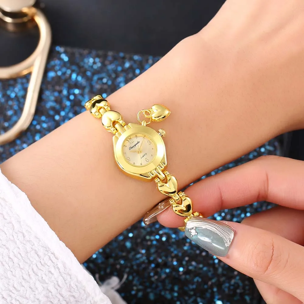 Chaoyada-Reloj de pulsera de acero para mujer, pulsera elegante con forma de corazón, mejor regalo