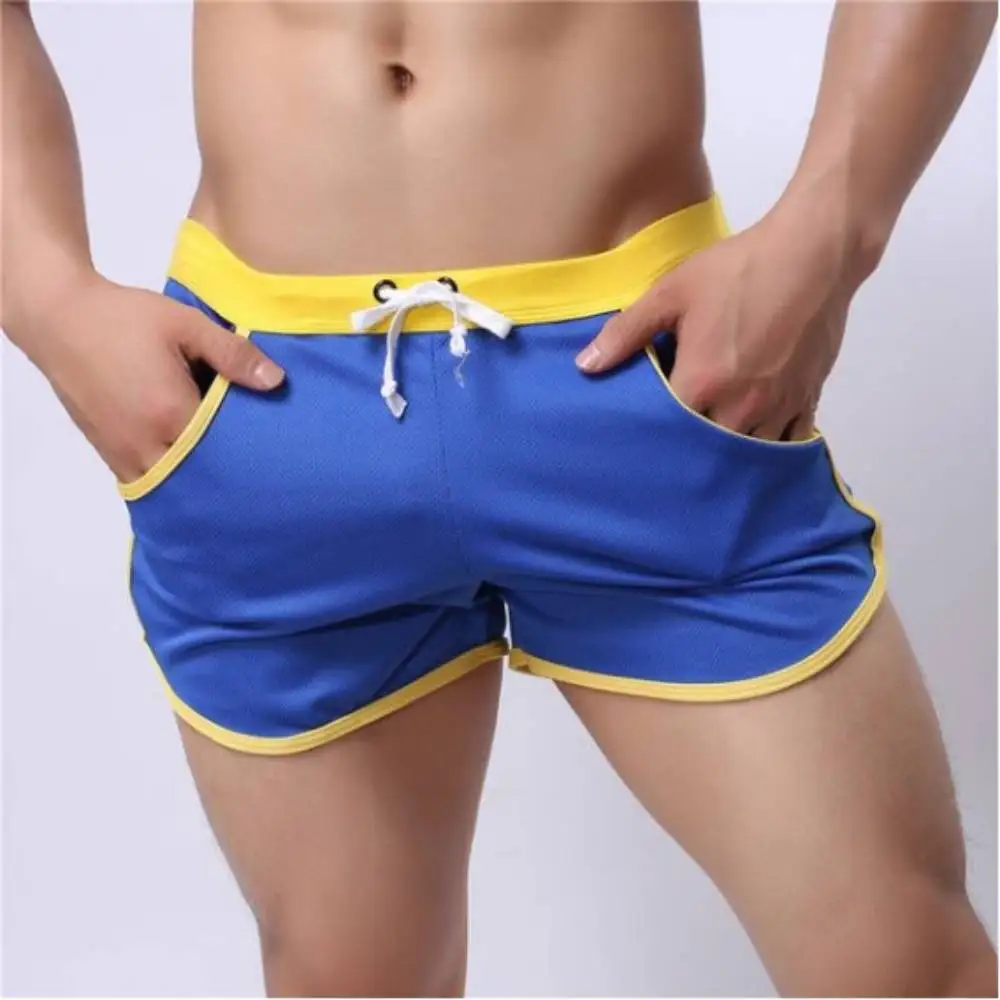 Bóxer de malla transpirable para hombre, bañador Sexy con bolsa convexa, pantalones cortos para surfear en la playa, gimnasio