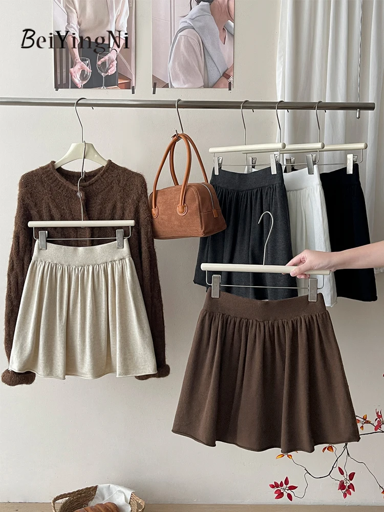 Beiyingni Donna Gonne a trapezio lavorate a maglia Tinta unita Moda coreana Elastico in vita Tutu Minigonna Francese Elegante Pianura Chic Gonne