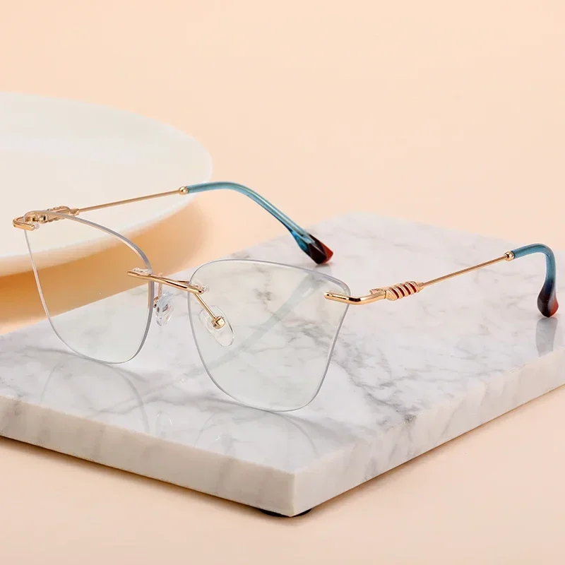 

Vintage Cat Eye Rimless Optical Frame Women Clear Lens Metal Glasses Blue Light Blocking Eyeglasses Female Decoration Ladies