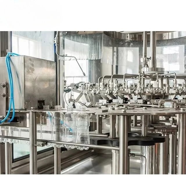 Automatic Bottling Line Rotary Type Bottle Washing Filling Capping Combined Line