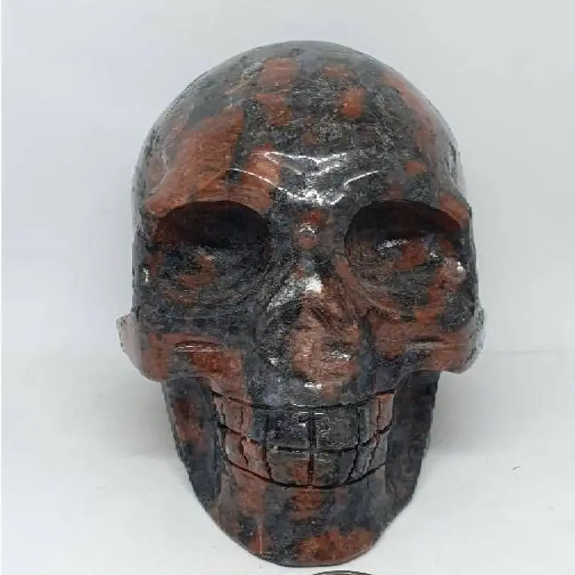 

100mm Skull Statue Natural Crystal Red Amphibole Stone Hand-Carved Small Skull For Healing And Furnishing Articles 1pcs