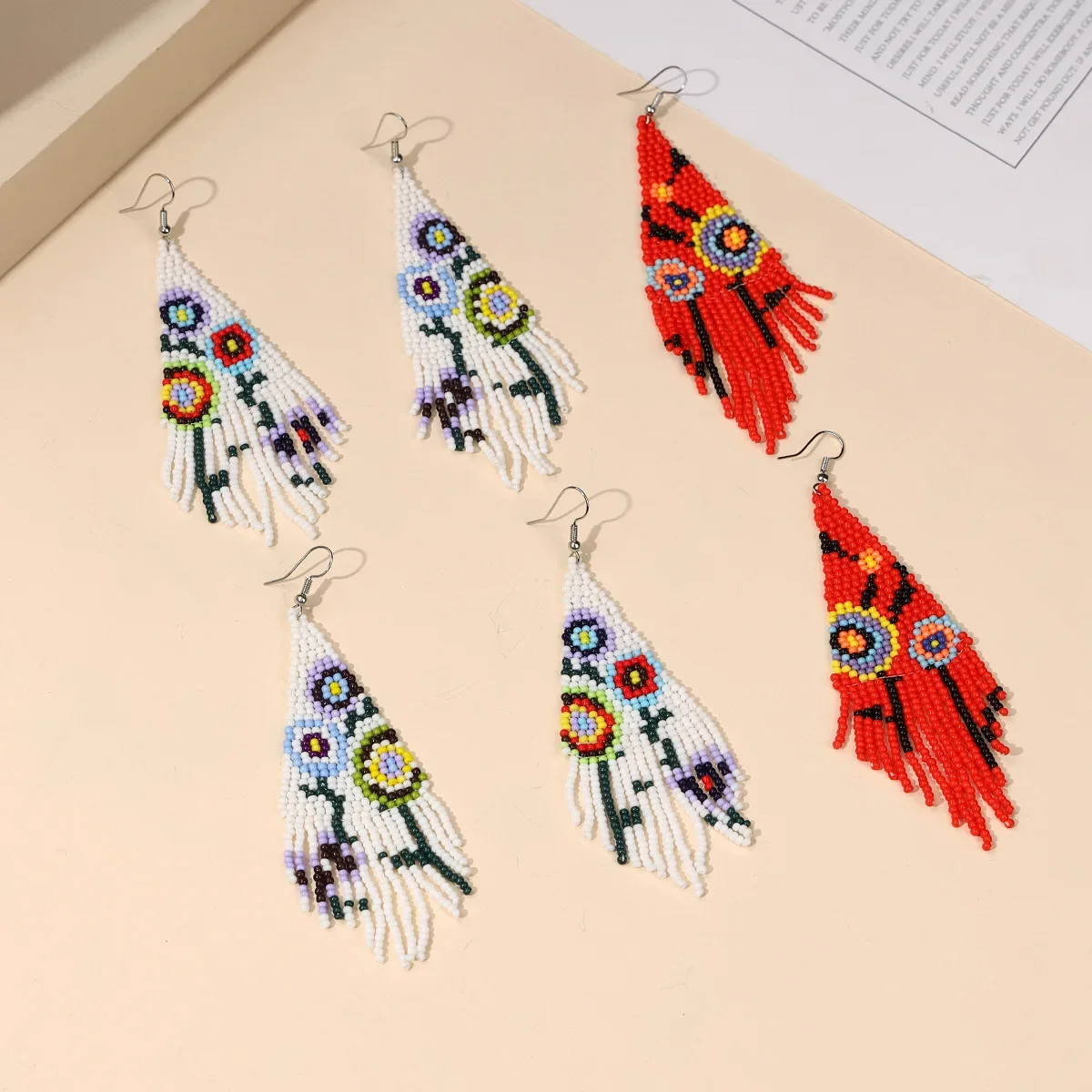 2025 Rice bead earrings Tassel Flowers Design Originality Hand knitting Bohemia Alloy Fashion Simple Beaded earrings