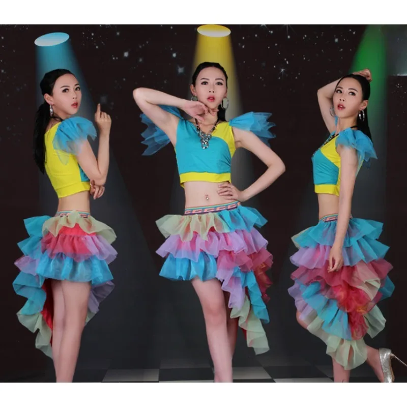 Female singer DJDS performs in fashionable jazz dance costumes on stage, modern dance fluffy skirts