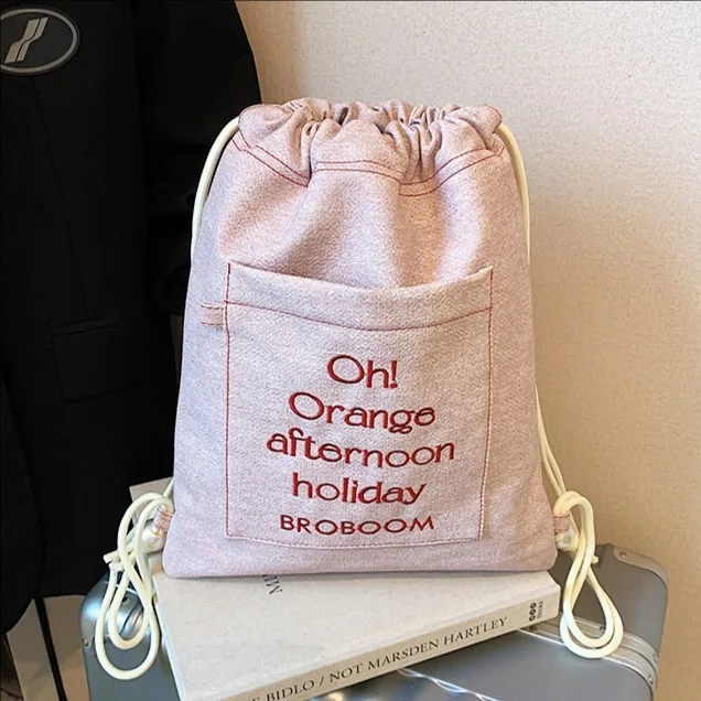 

2025 New Korean Style Letter Embroidery Drawstring Tote Bag for Women Designer Luxury Backpack Lazy Student School Bag Travel