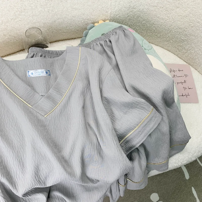 Novedad de verano 2025, pijamas cortos informales lisos para hombre, conjunto de pijamas sencillos de moda con cuello en V fino de estilo coreano para hombre