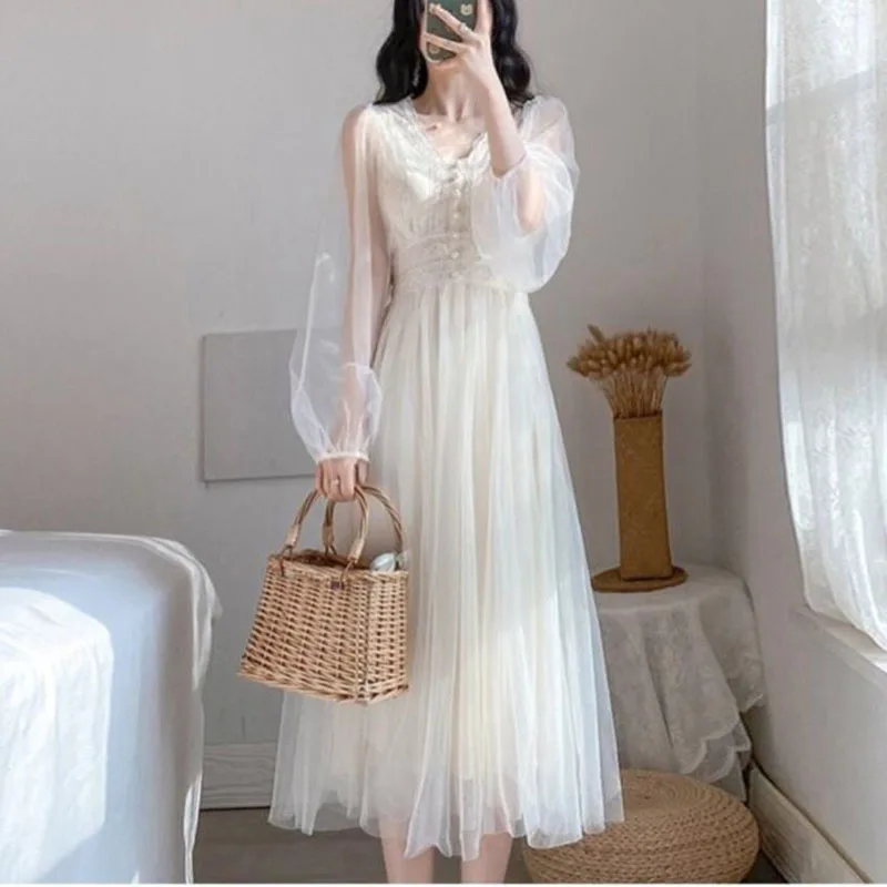 

Fashion French 2024 Spring New Immortal Qi Solid Color Net Yarn V-neck High Waist Puff Sleeve Forest System Long Sleeve Dress