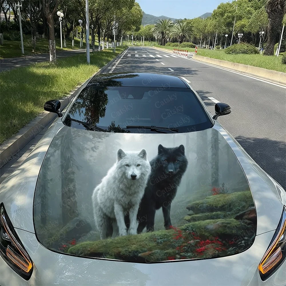 Elegant car hood wrap featuring a striking duo of white and black wolves in a mystical forest setting. Perfect for nature lovers