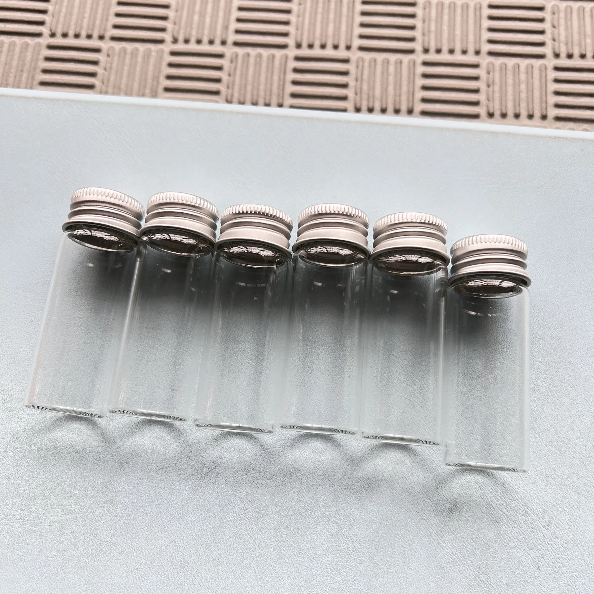 

Glass Bottles 72 Pcs 22*60 tiny Transparent Glass tube with Silver Aluminium Screw Cap Cute Glass Jars Vials DIY Craft