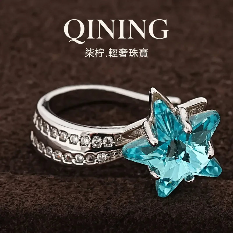 Xinghai chasing dreams, full of sea blue colored treasures, star ear clips, women's earrings without earrings, light luxury