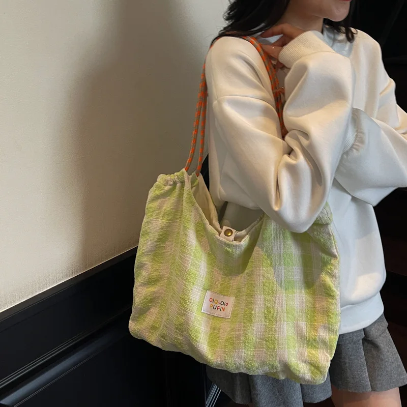

2025 new ladies versatile canvas shoulder tote bag lazy style fresh plaid students commuting to school daily work large capacity