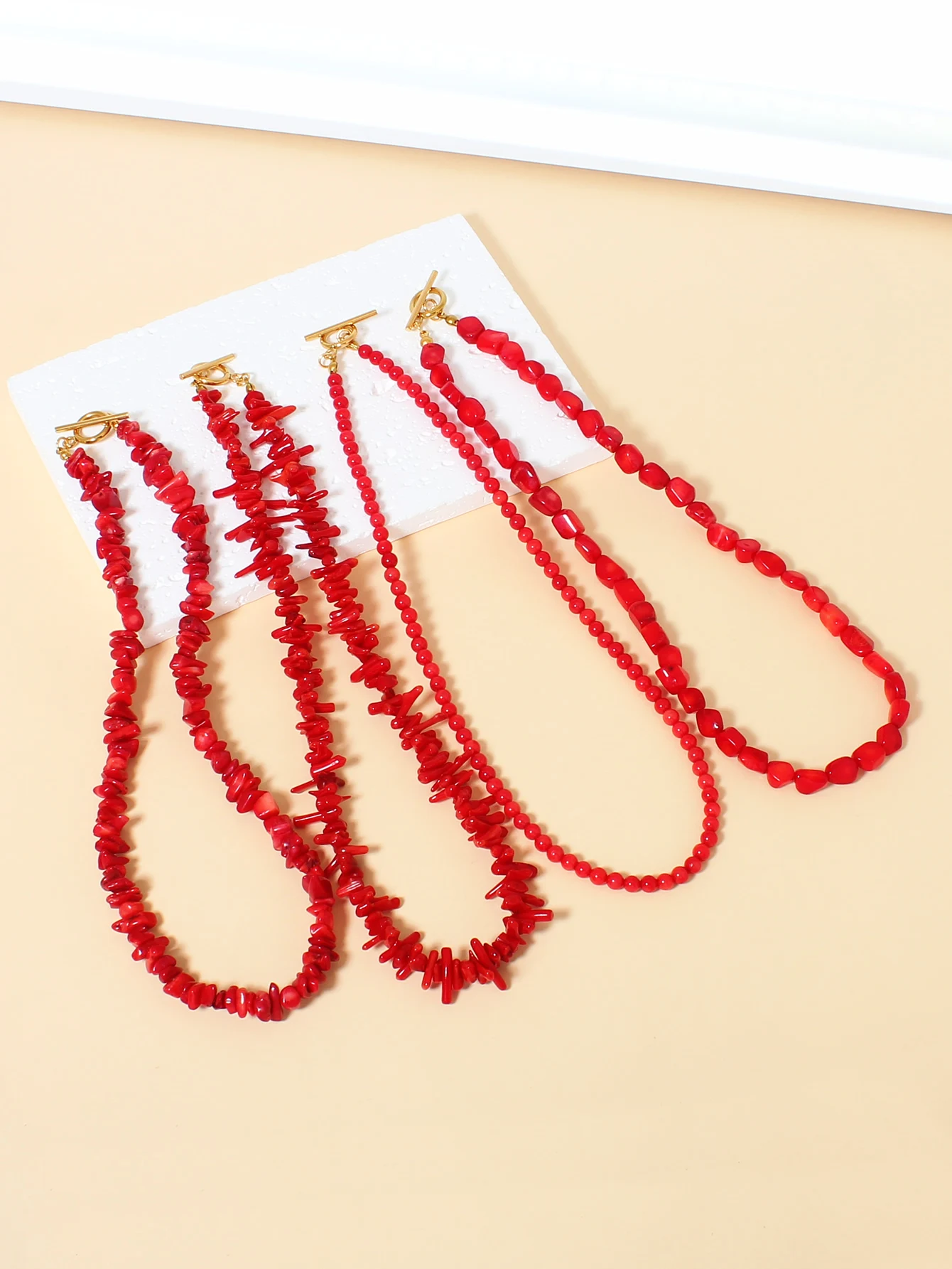 

Beautiful red coral necklace with stainless steel accessories for both men and women, length 40-42CM