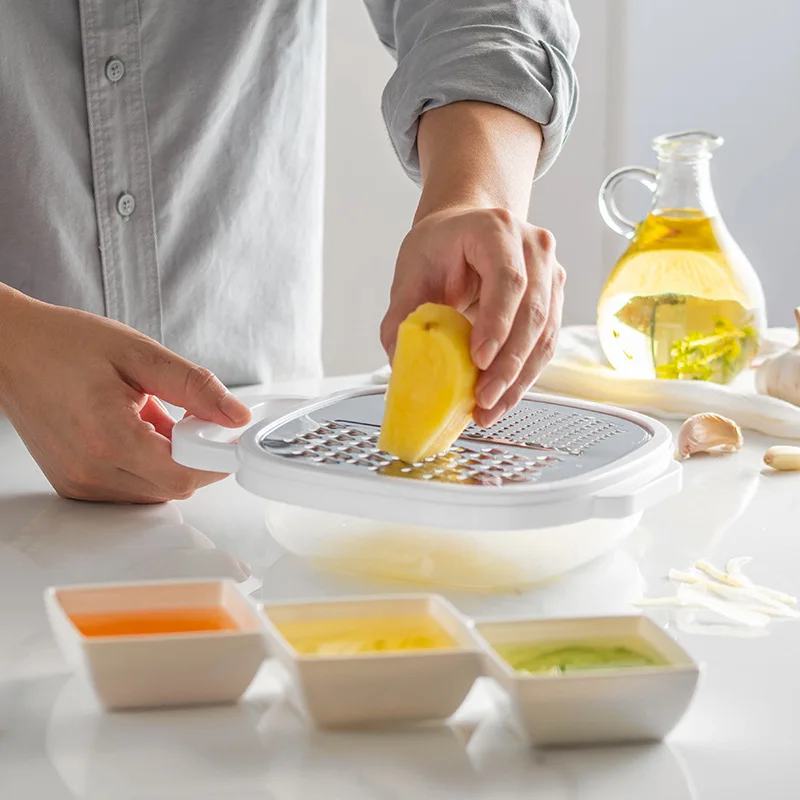 Juego de rallador y pelador de queso de acero inoxidable con contenedor y tapa, Kit de utensilios de cocina multifuncionales para verduras, 1 unidad