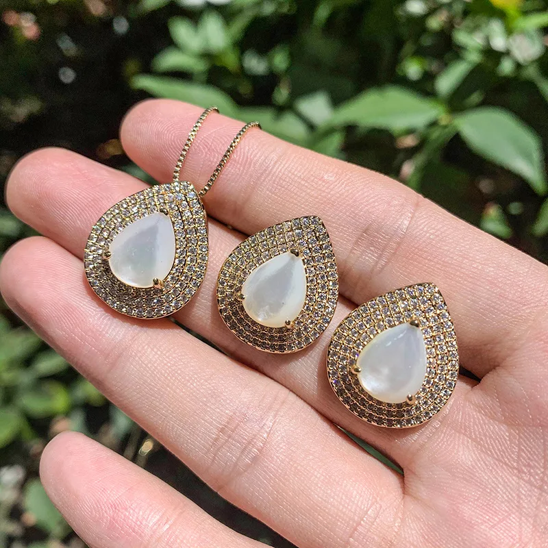 

European and American popular fashion micro-inlaid white shell earrings and pendant set accessories, water drop white shell earr
