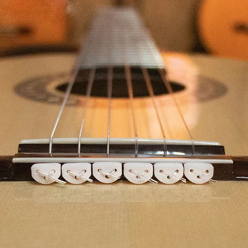 12 pz/set corda per chitarra classica fermaglio per corde guida con fibbia a corda corda a triplo angolo per chitarra/Ukulele Accs