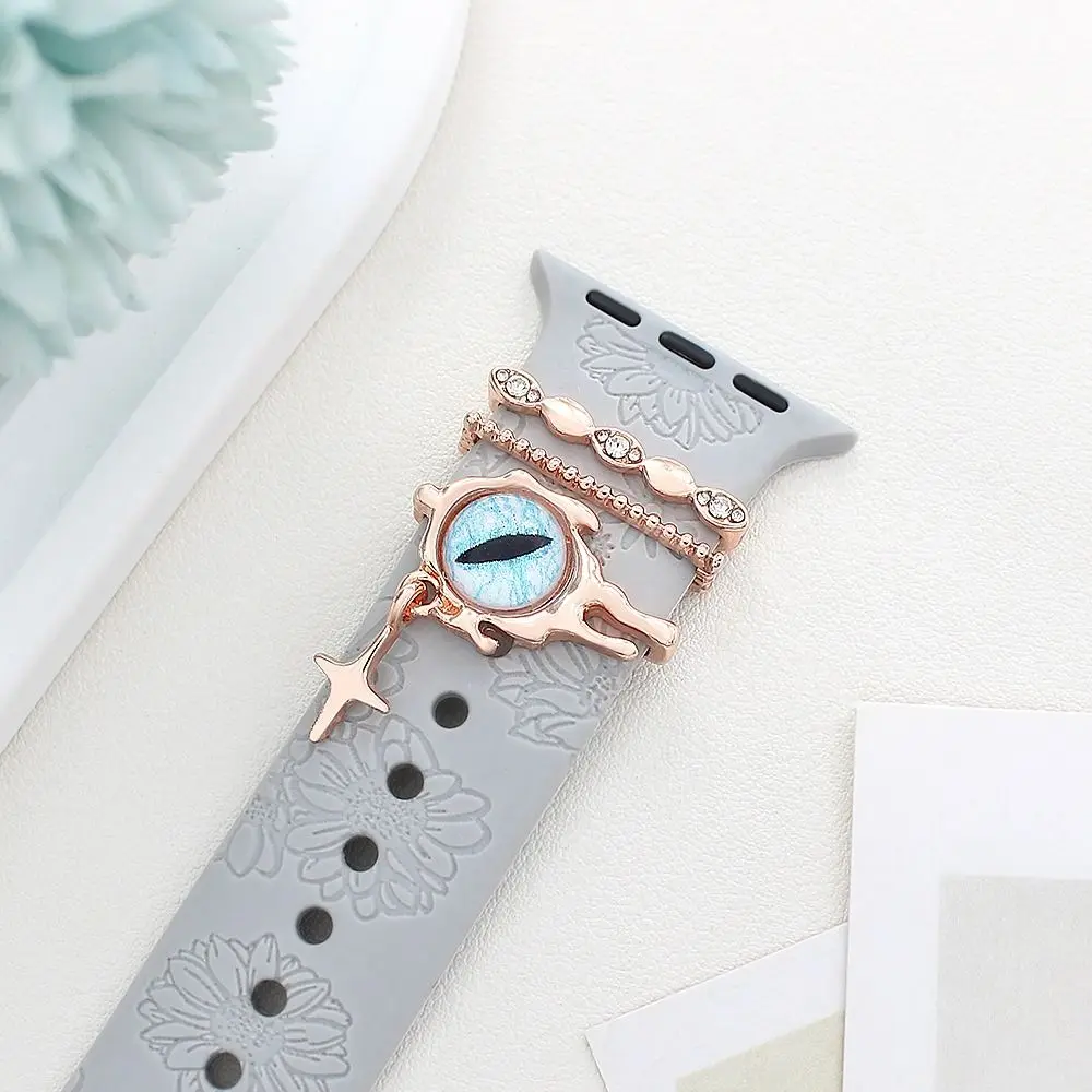 สายรัดโลหะตกแต่งแหวนเครื่องประดับเพชรสร้อยข้อมือตกแต่งตาสีฟ้า Charms เครื่องประดับสําหรับ Apple Watch Band