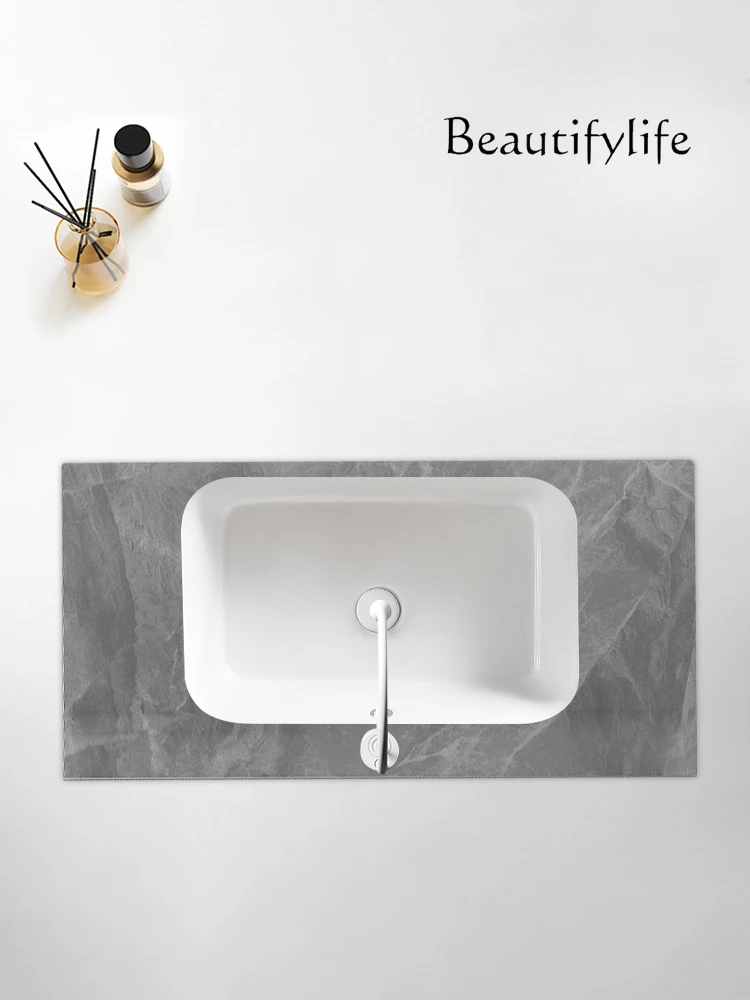 Rock slab countertop seamlessly deepens under-counter basin integrated basin ceramic laundry basin